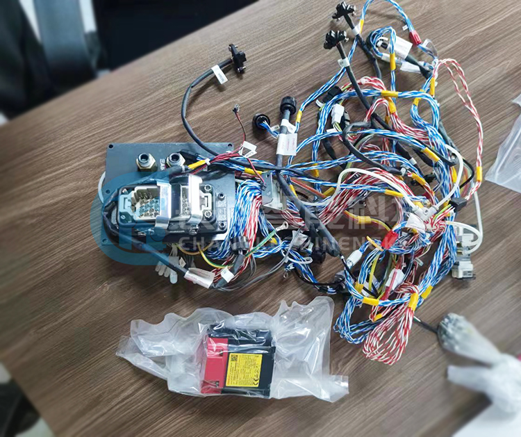 Repair the Fanuc robot LR Mate 200iD that has been submerged in water