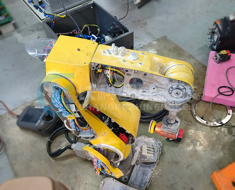 Repair the Fanuc robot LR Mate 200iD that has been submerged in water